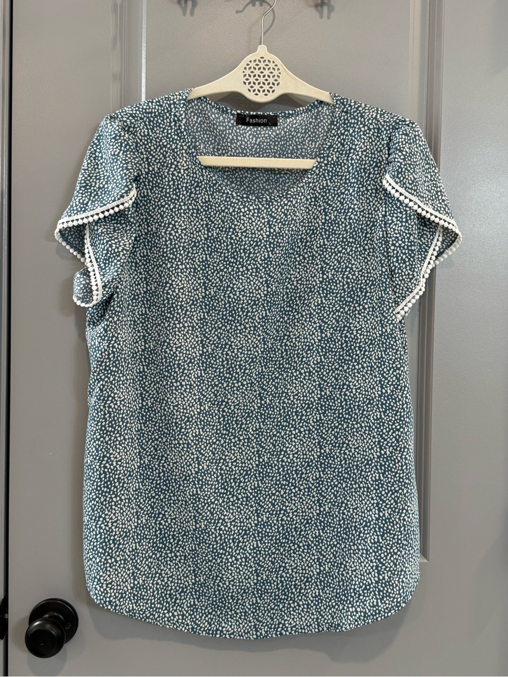 Amazon Teal Dot-Print Ruffle Sleeve Blouse with Pom Trim